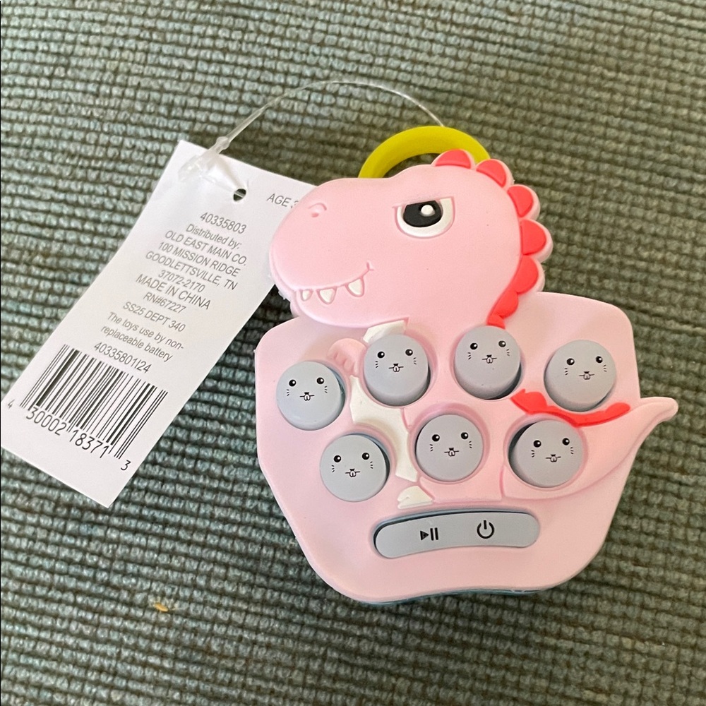 Pink Dinosaur Musical Toy